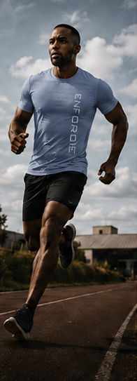 Man running on track in ENFORCE performance tee