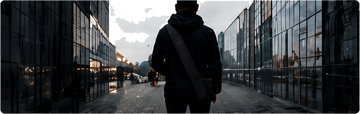 Man with crossbody bag in city