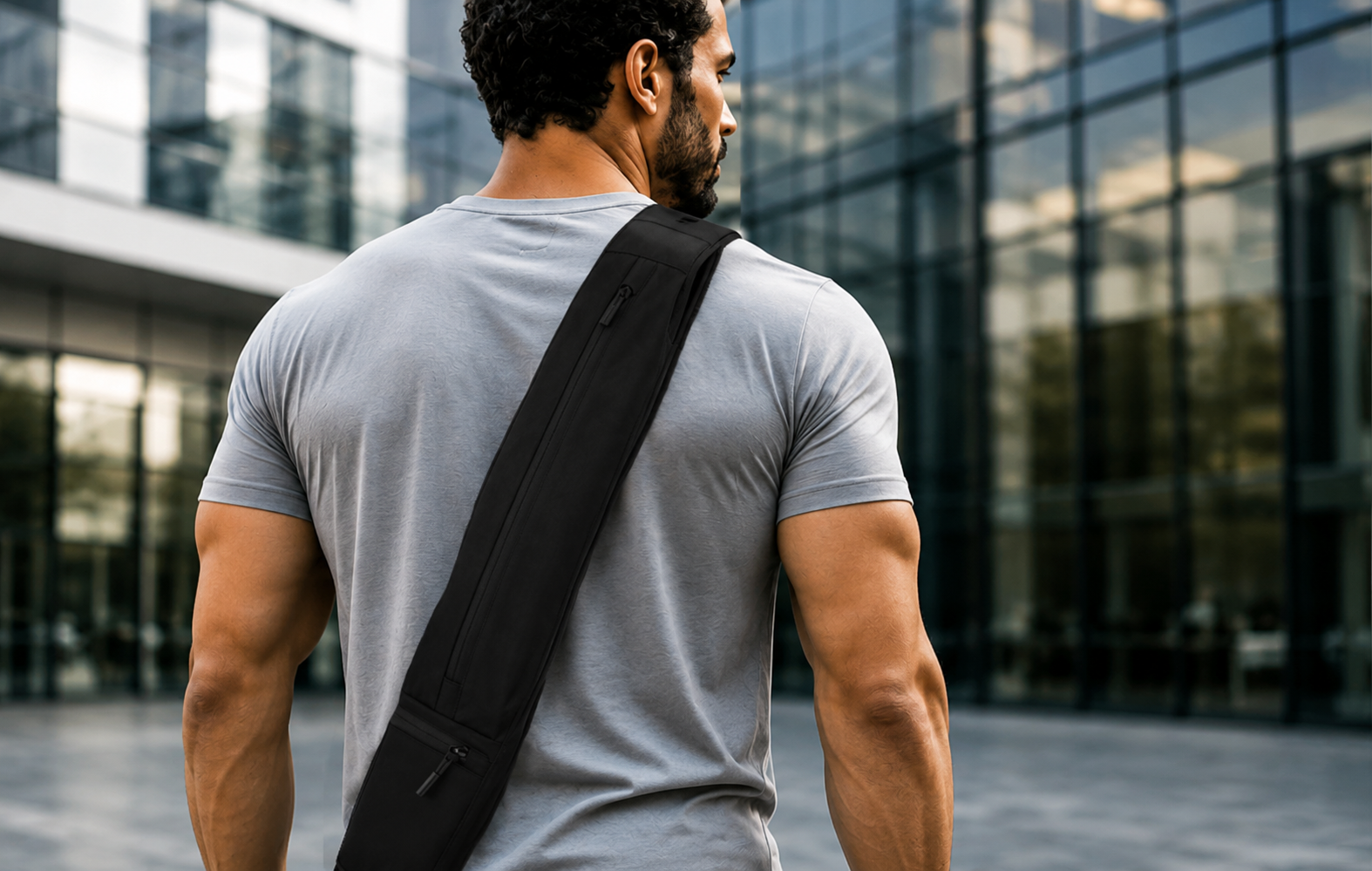 Man wearing ENFORCE crossbody sling bag